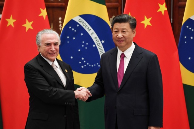 Temer diz na China que Brasil virou a página das crises política e económica