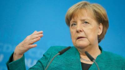 Angela Merkel confirma quatro rostos novos no governo incluindo Jens Spahn