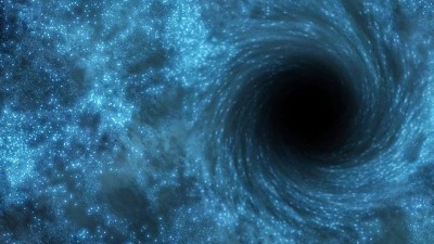 Astrónomos detectam buraco negro ‘supermassivo’ a grande distância do centro de galáxia