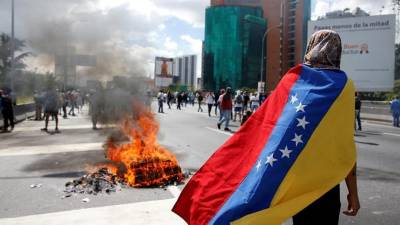 Comunidade portuguesa na Venezuela queixa-se de indiferença e reacção tardia de Lisboa