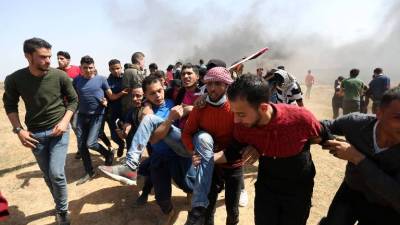 Dois palestinianos mortos e 83 feridos em protestos na faixa de Gaza
