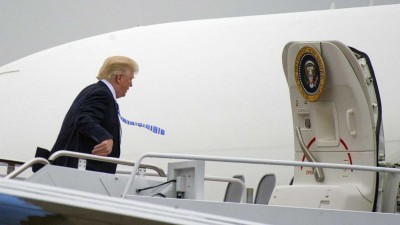Manifestantes apelam à “resistência” em protesto num campo de golfe de Donald Trump