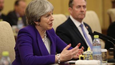 May contra direitos iguais para cidadãos da UE que cheguem após o ‘Brexit’