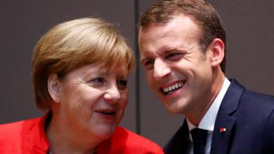 Merkel e Macron saúdam acordo que salva a face da UE