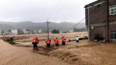 Número de mortos em deslizamentos de terras na China sobe para 26