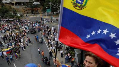 Parlamento aprova votos do PSD/CDS a condenar mortes de manifestantes na Venezuela