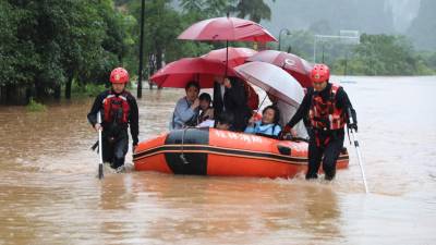 Pelo menos 20 mortos em inundações e deslizamentos de terra no sul da China
