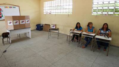 Pouca afluência às urnas na Venezuela e população dividida sobre votar ou não