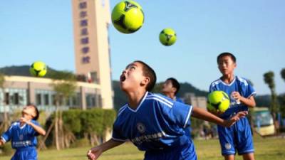 Quase 4 mil escolas primárias chinesas incluíram o futebol no programa curricular