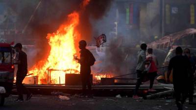 Quatro protestantes mortos e 108 feridos em protestos no Iraque