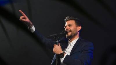 Santos populares ao som de Ruben Aguiar