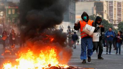 Três mortos em incêndio em supermercado durante protestos no Chile
