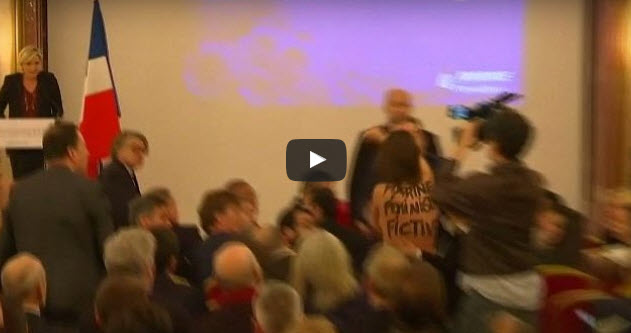 Marine Le Pen interrompida por ativista em topless [vídeo]